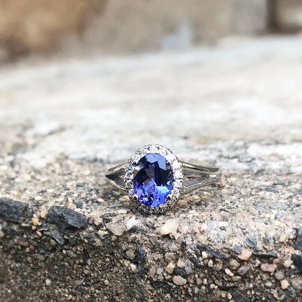Oval Cut Tanzanite with Diamond Halo and Split Shoulder Ring